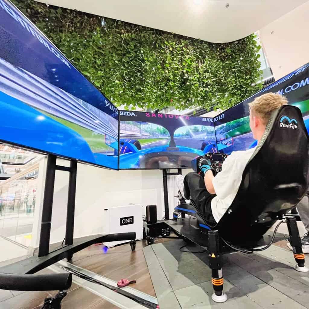 pronájem simulátoru formule E pro udržitelné budoucí události, licencovaný simulátor formule E se sedadlem